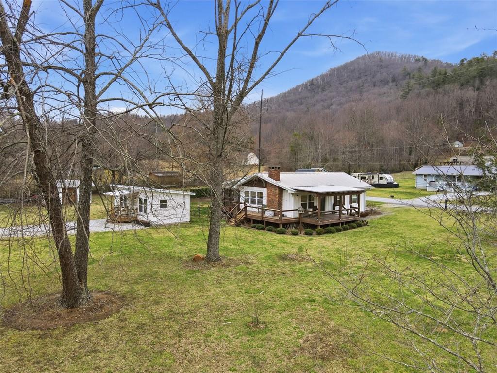 21 McIntosh Lane Rabun Gap, GA 30568 - Photo 4 of 53 a view of a house with a yard