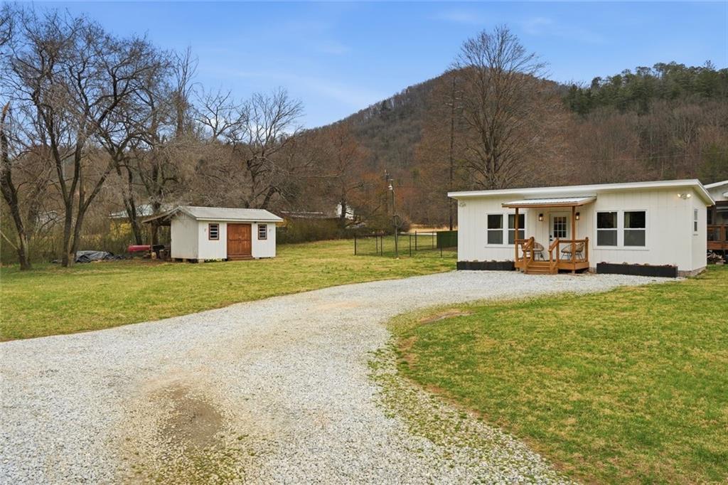 21 McIntosh Lane Rabun Gap, GA 30568 - Photo 46 of 53 a view of house with outdoor space and swimming pool