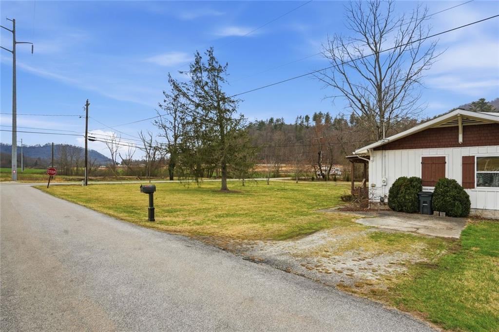 21 McIntosh Lane Rabun Gap, GA 30568 - Photo 48 of 53 a view of a house with a yard