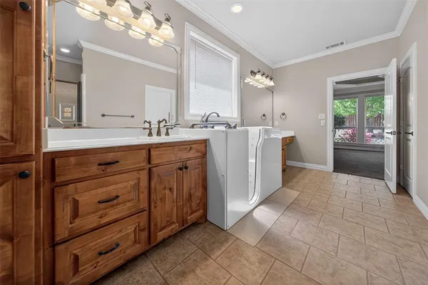 a room with a cabinets and sink