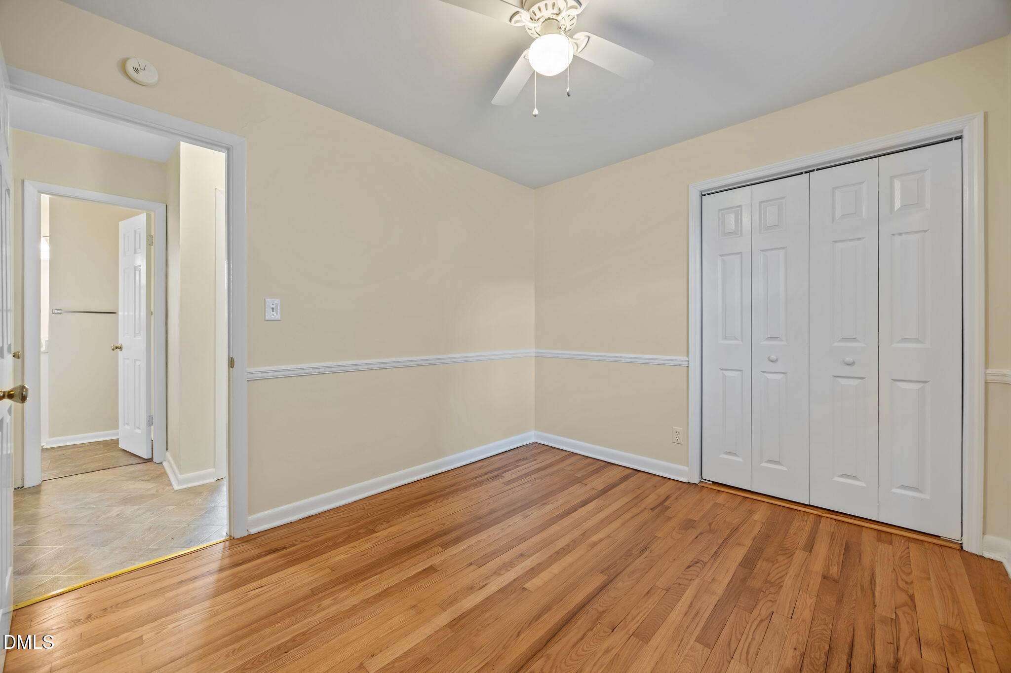 131 Fairview Village Road Dunn, NC 28334 - Photo 13 of 43 an empty room with wooden floor