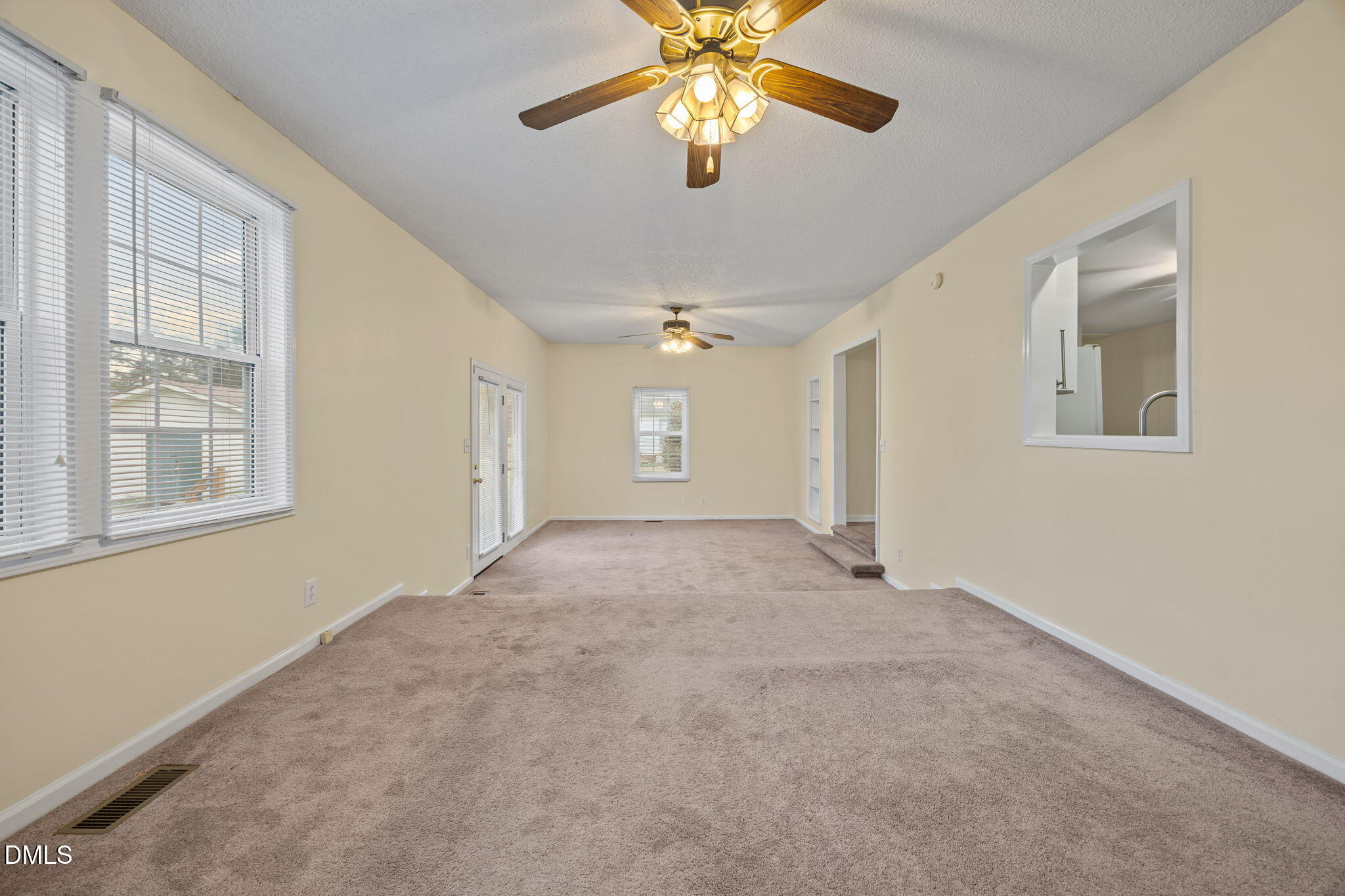 131 Fairview Village Road Dunn, NC 28334 - Photo 25 of 43 a view of an empty room with a window