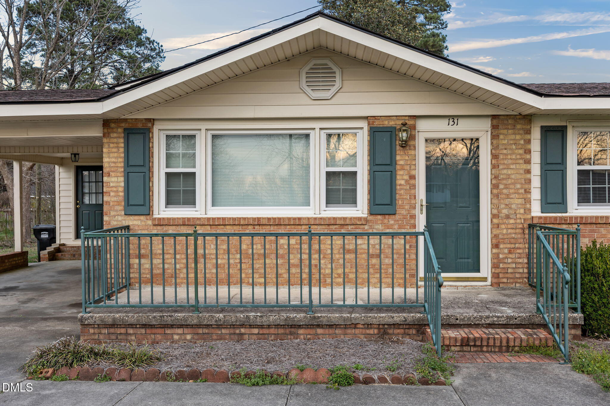 131 Fairview Village Road Dunn, NC 28334 - Photo 30 of 43 a front view of a house with a garden