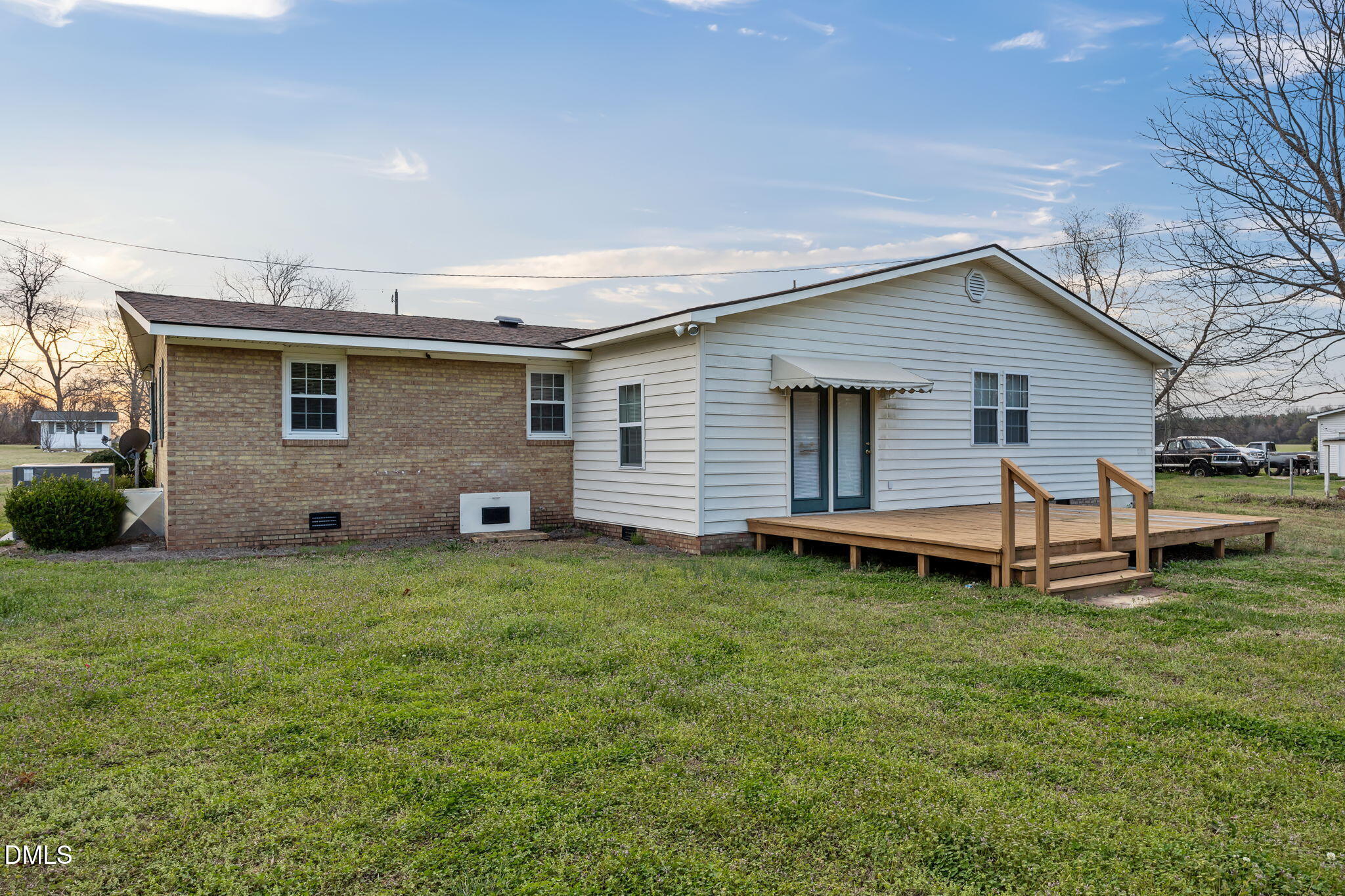 131 Fairview Village Road Dunn, NC 28334 - Photo 34 of 43 a front view of a house with a garden