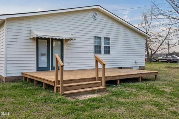 a view of backyard of house