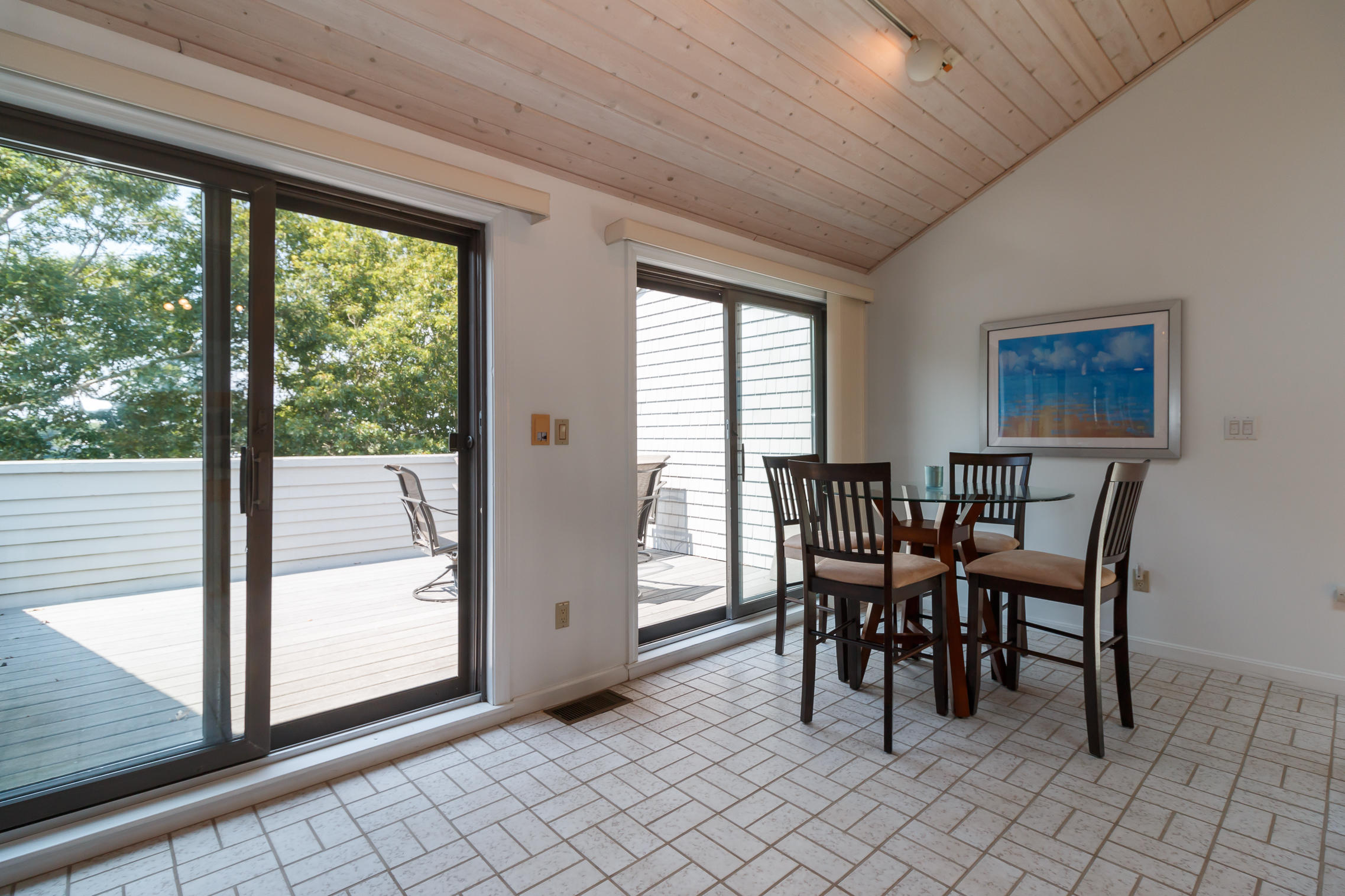 381 Great Oak Road, Unit 17 Mashpee, MA 02649 - Photo 23 of 35 Family Rm Dining Area - Deck - View