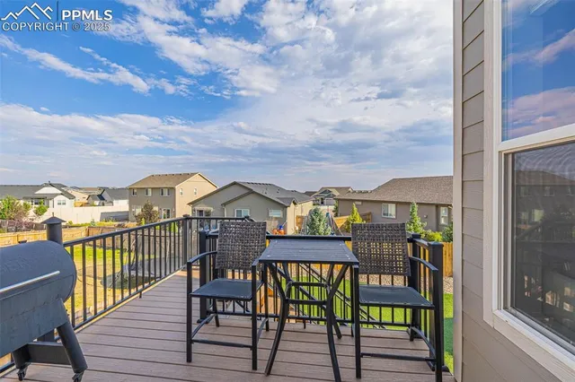 a view of a chairs on a deck