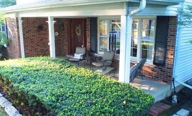 front view of a house with a glass door