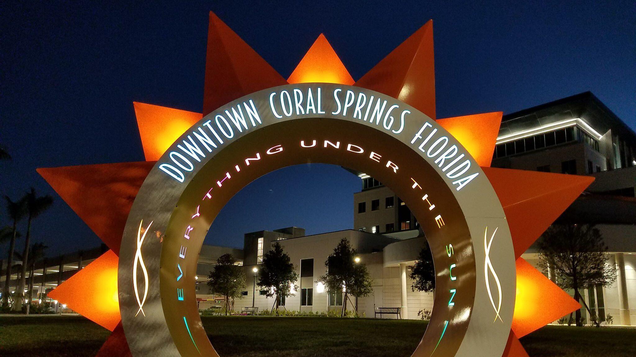 8605 West Sample Road, Unit 311 Coral Springs, FL 33065 - Photo 10 of 13 downtown-coral-springs -sign