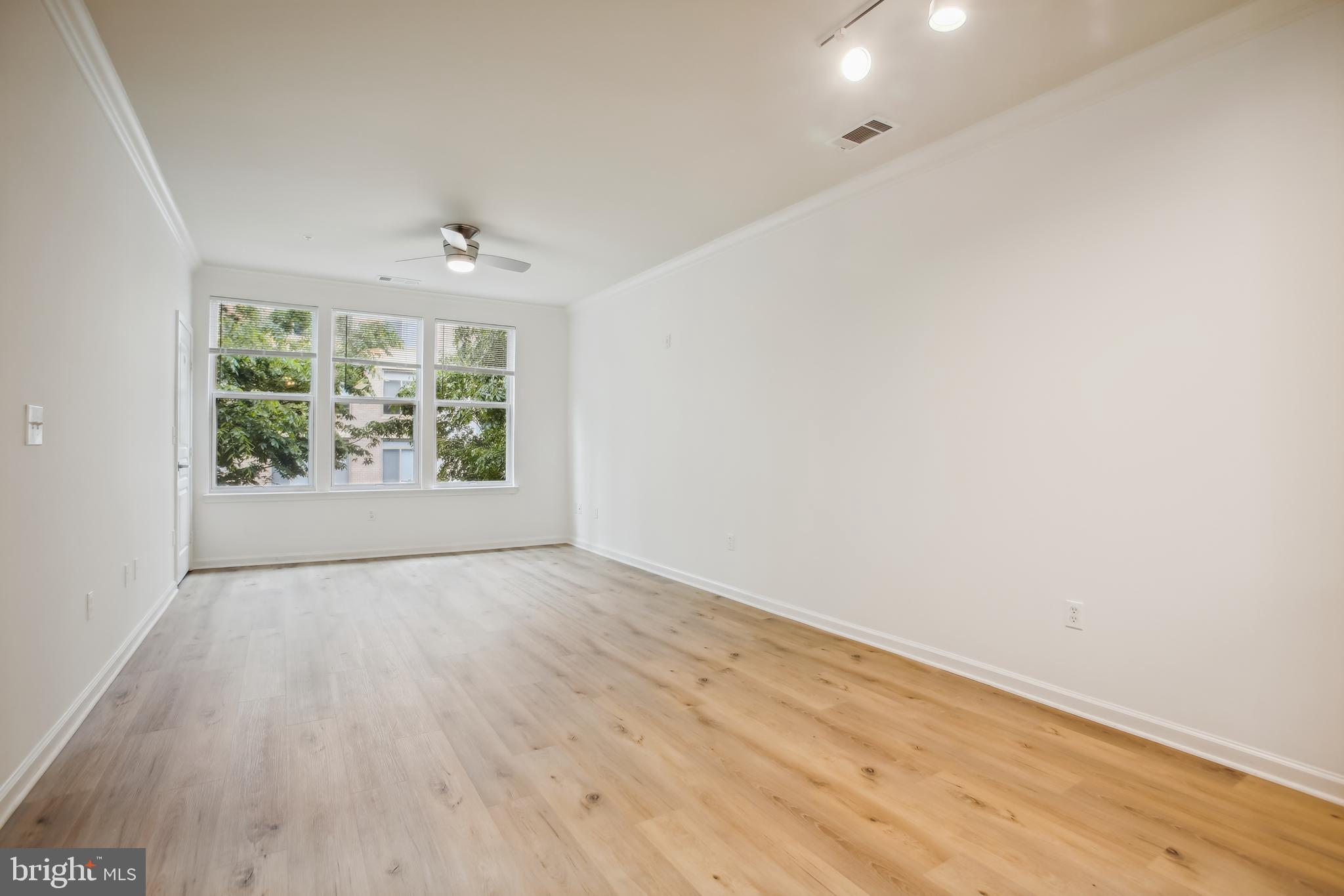 12000 Market Street, Unit 249 Reston, VA 20190 - Photo 13 of 58 Living Room