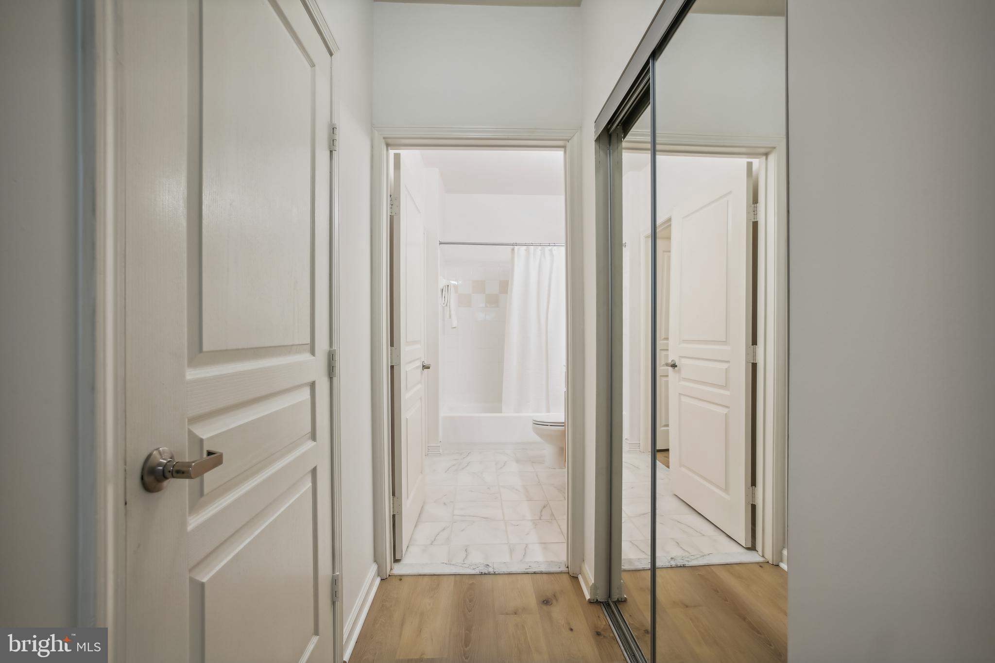 12000 Market Street, Unit 249 Reston, VA 20190 - Photo 25 of 58 Connecting Hallway to bath
