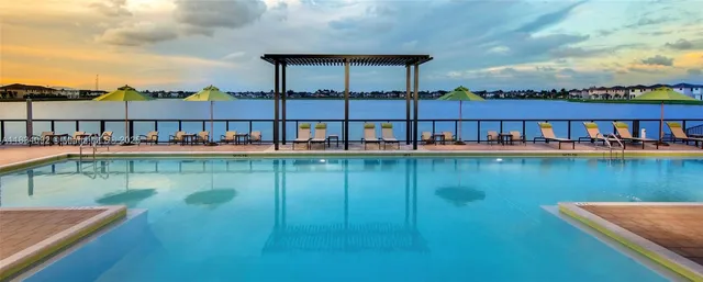 a view of a lake with building in front of it