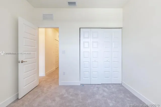 an empty room with closet