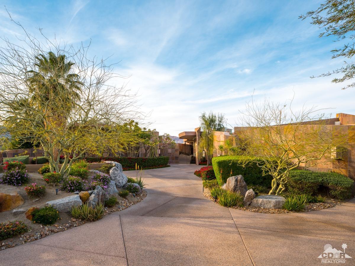 632 Pinnacle Crest Palm Desert, CA 92260 - Photo 13 of 52 a view of a pathway both side of building