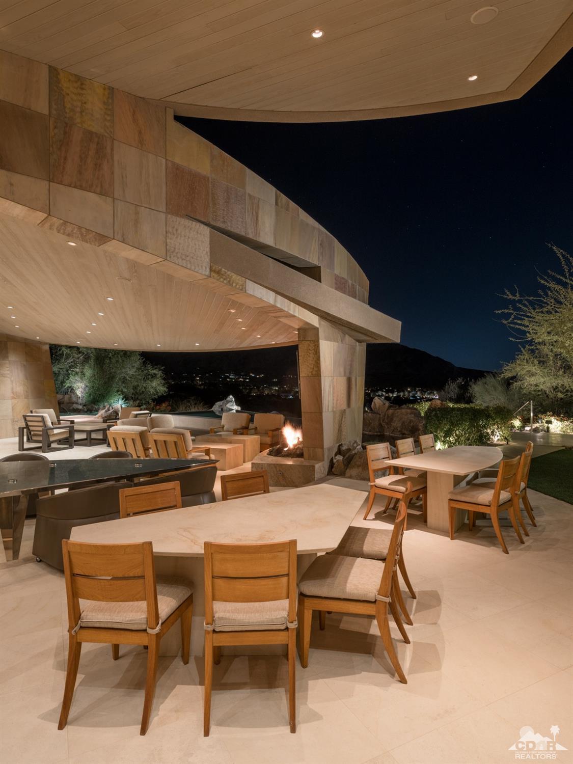 632 Pinnacle Crest Palm Desert, CA 92260 - Photo 20 of 52 a living room with furniture and a fireplace