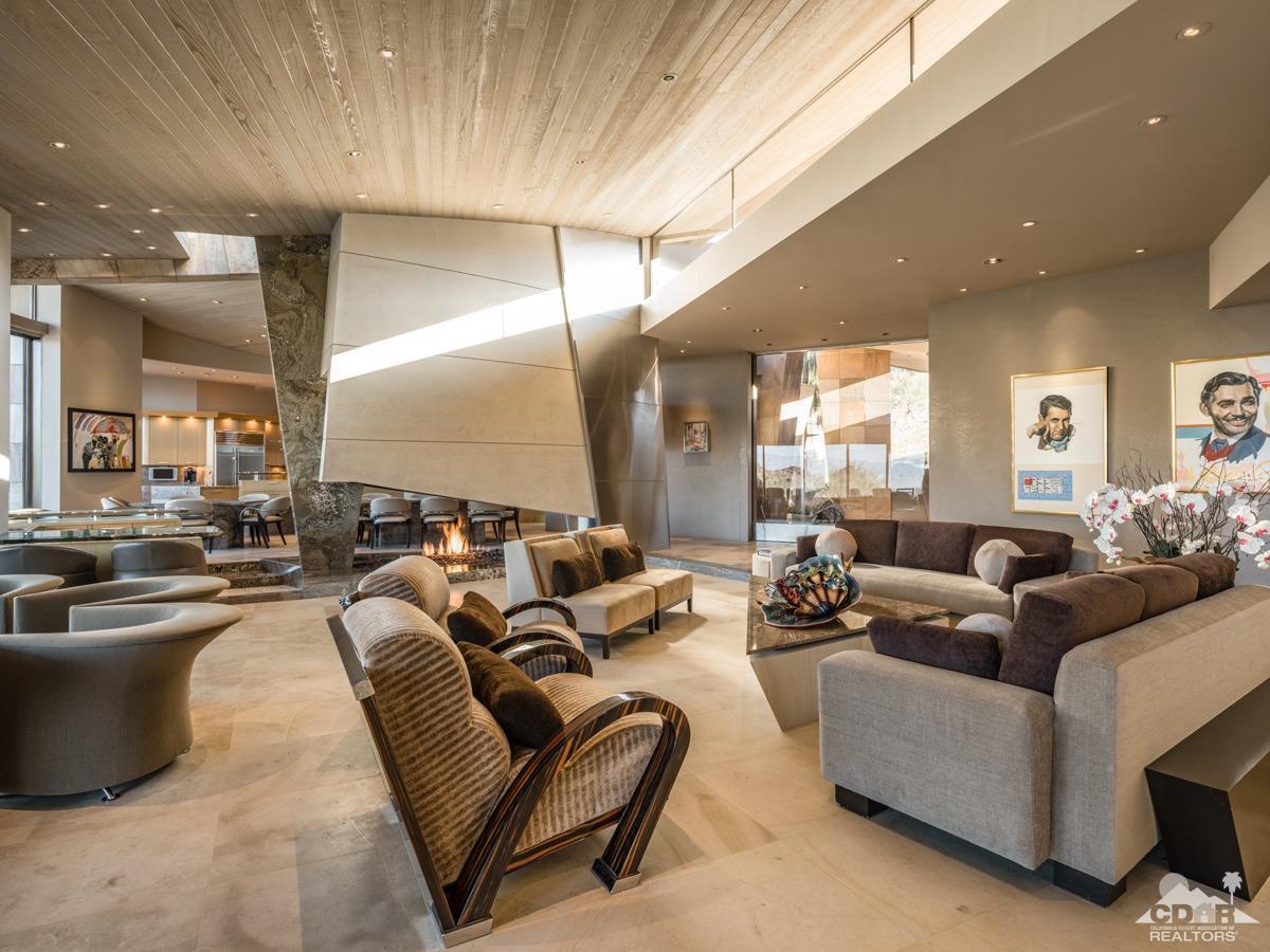 632 Pinnacle Crest Palm Desert, CA 92260 - Photo 23 of 52 a living room with furniture and a large window