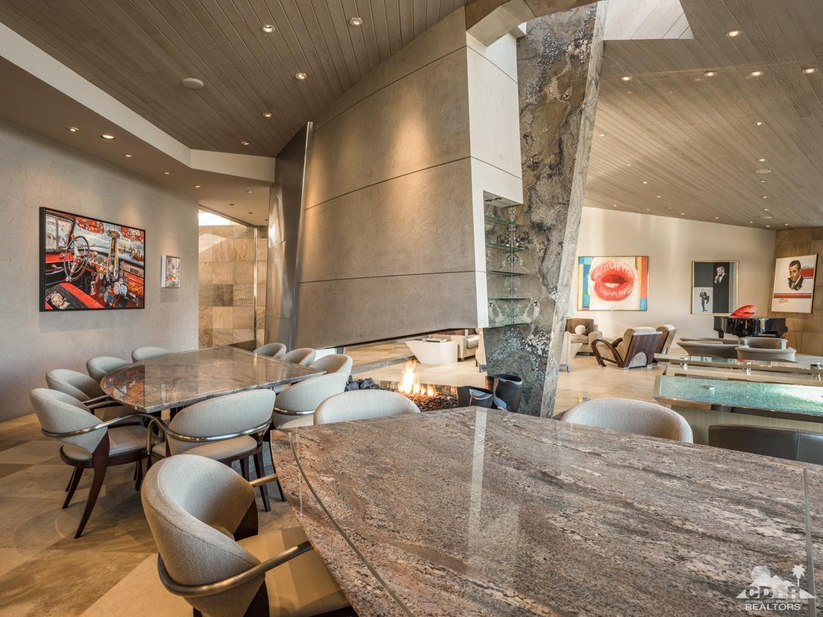 632 Pinnacle Crest Palm Desert, CA 92260 - Photo 27 of 52 a room with furniture and air hockey table