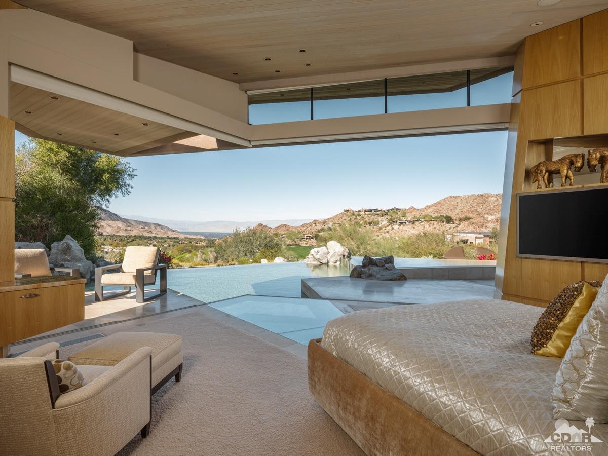 632 Pinnacle Crest Palm Desert, CA 92260 - Photo 31 of 52 a view of a living room and floor to ceiling window or couch