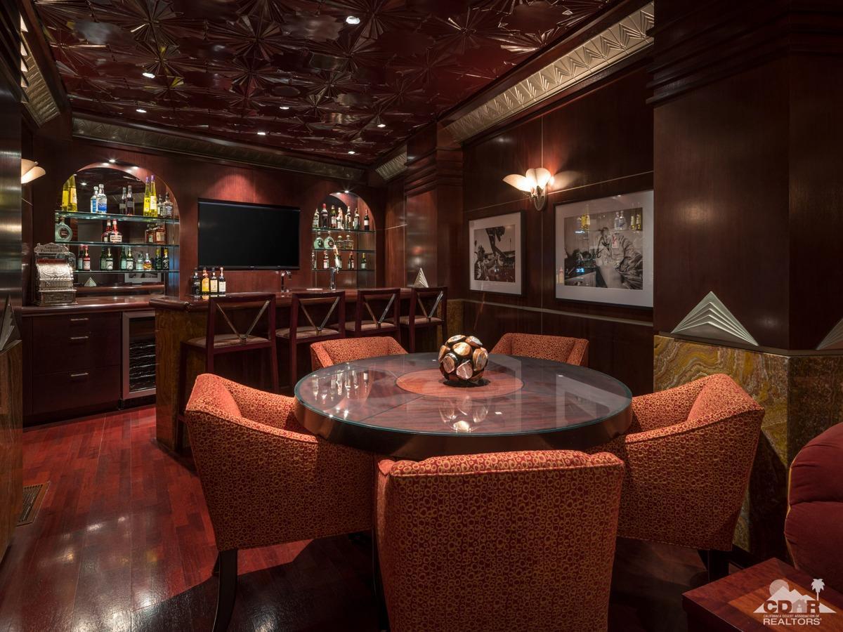 632 Pinnacle Crest Palm Desert, CA 92260 - Photo 38 of 52 a view of a dining room with furniture