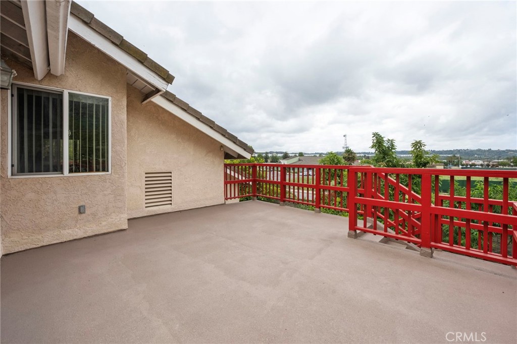 605 Bronco Way Walnut, CA 91789 - Photo 45 of 69 a view of a terrace with glass top table and chairs