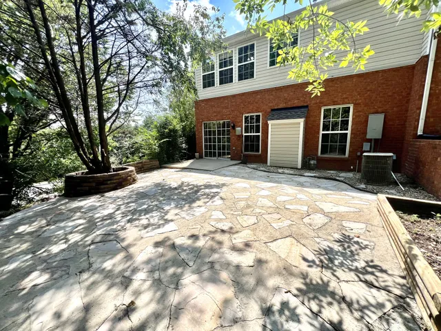 a view of a house with a patio