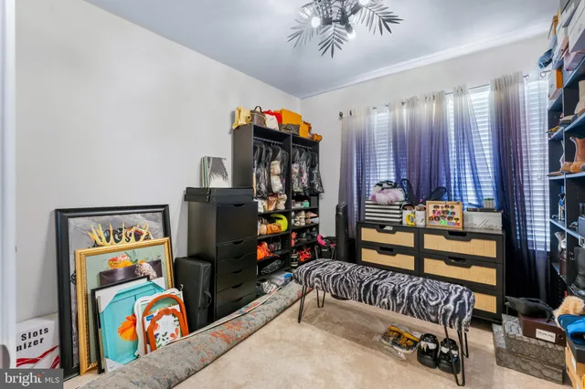 a very nice looking room with a book shelf