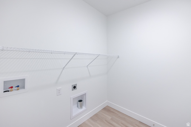 4727 South 690th West, Unit W304 Mapleton, UT 84664 - Photo 4 of 15 White wire shelving, wood-finish flooring, and white walls