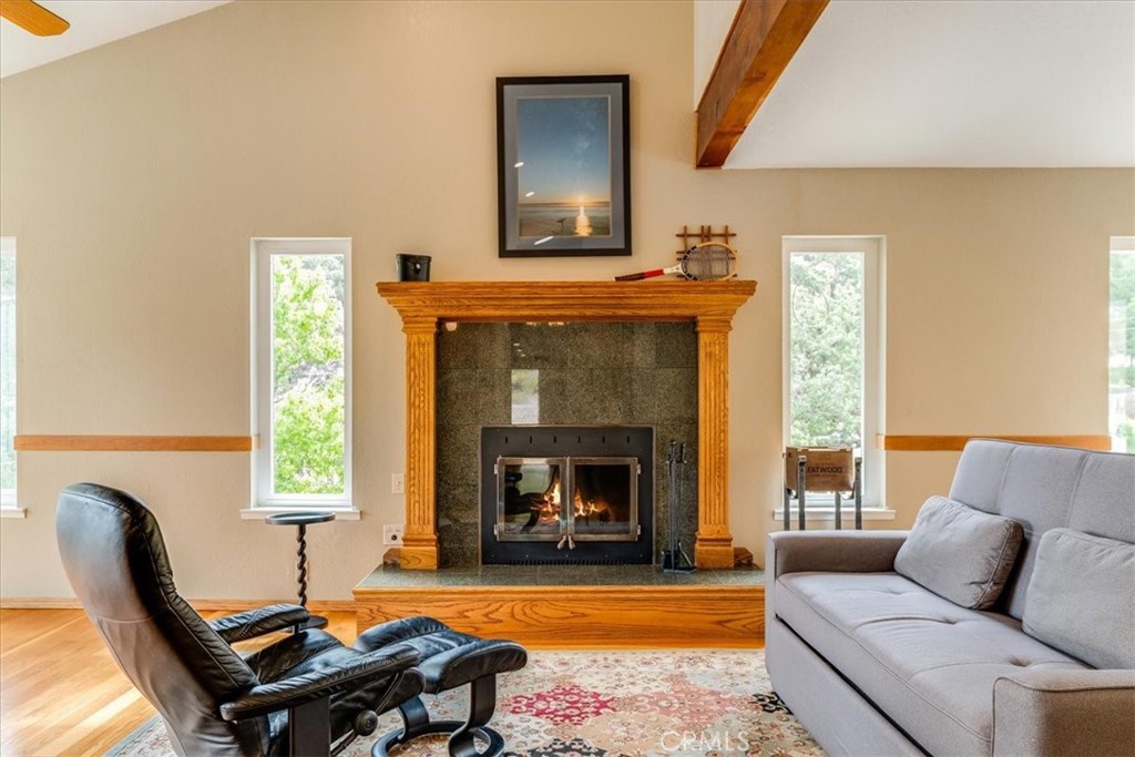 11555 Cenegal Road Atascadero, CA 93422 - Photo 19 of 57 a living room with furniture fireplace and window