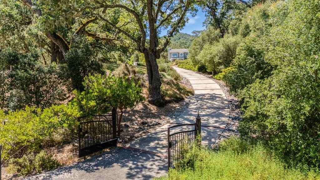 11555 Cenegal Road Atascadero, CA 93422 - Photo 2 of 57 a backyard of a house with lots of green space