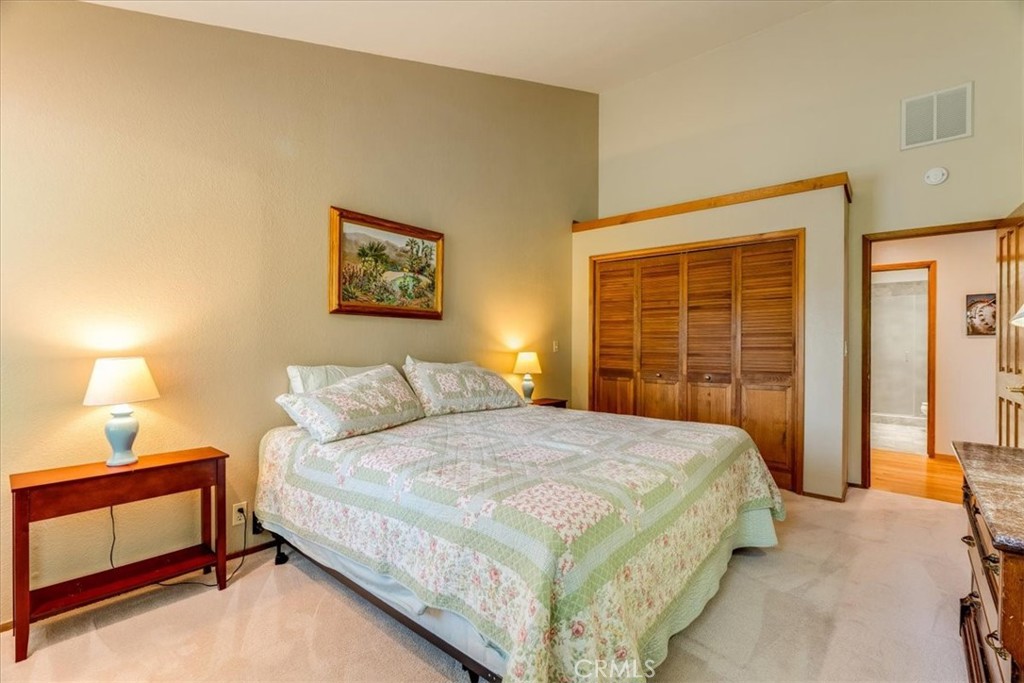 11555 Cenegal Road Atascadero, CA 93422 - Photo 33 of 57 a bedroom with a bed and a window