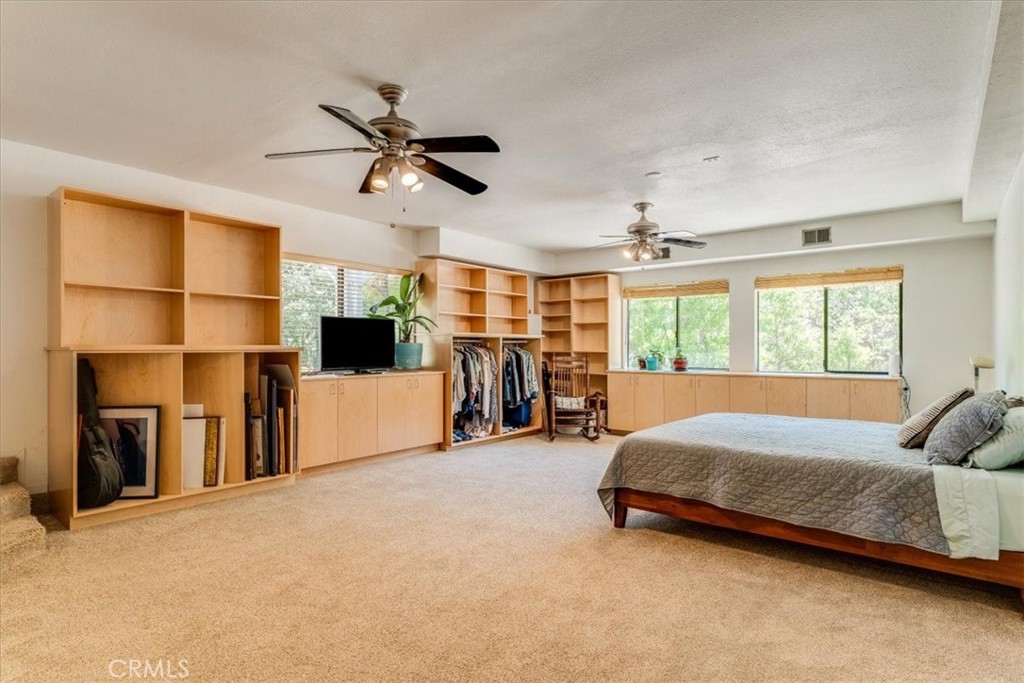 11555 Cenegal Road Atascadero, CA 93422 - Photo 37 of 57 a bed room with a bed and a chair