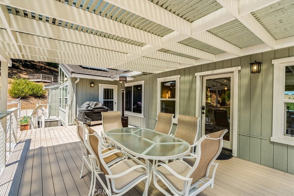 11555 Cenegal Road Atascadero, CA 93422 - Photo 43 of 57 a dining room with furniture and wooden floor