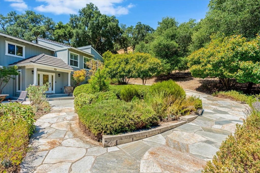 11555 Cenegal Road Atascadero, CA 93422 - Photo 7 of 57 a front view of a house with a yard