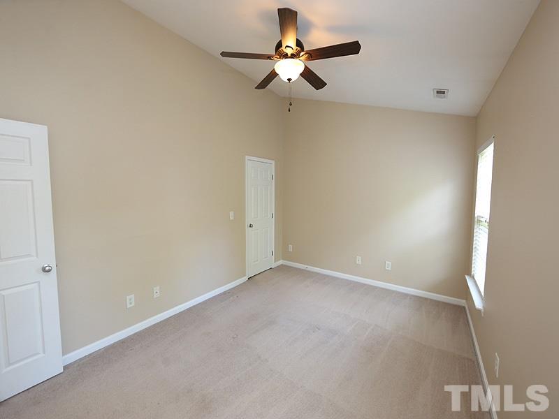 8336 Tie Stone Way Raleigh, NC 27613 - Photo 11 of 20 a view of room with a ceiling fan and a window
