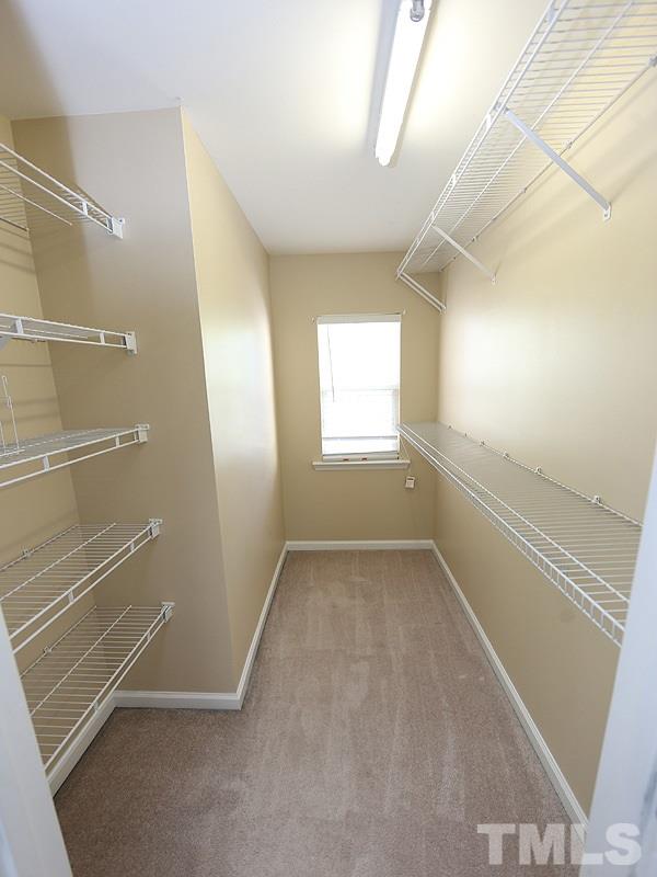 8336 Tie Stone Way Raleigh, NC 27613 - Photo 14 of 20 a view of an empty room with a window