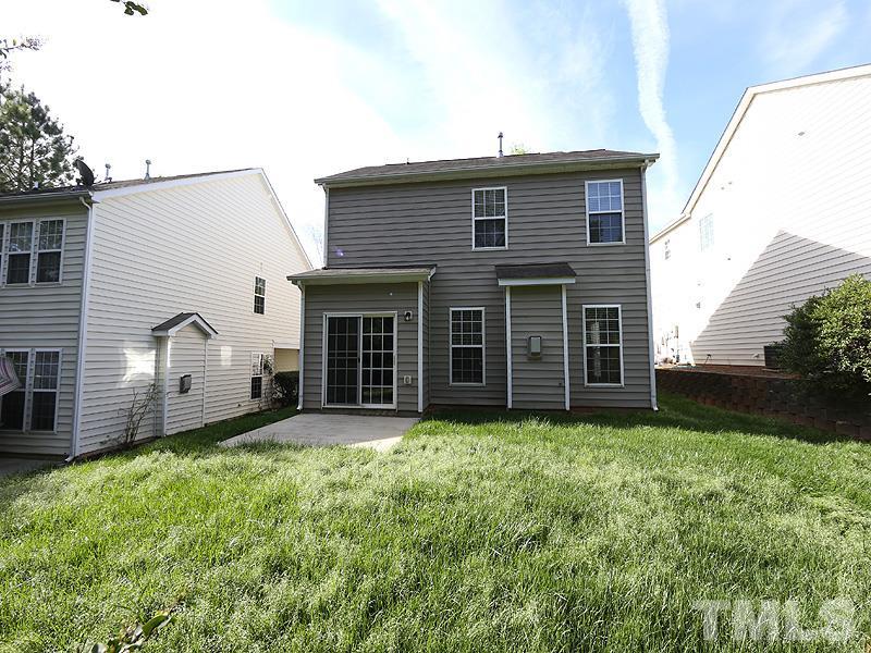 8336 Tie Stone Way Raleigh, NC 27613 - Photo 19 of 20 a view of a house with a yard and pathway