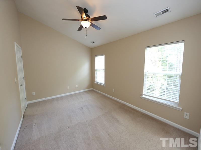 8336 Tie Stone Way Raleigh, NC 27613 - Photo 10 of 20 a view of an empty room with a window