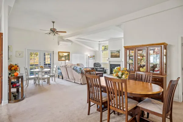 a view of a dining room with furniture window and outside view