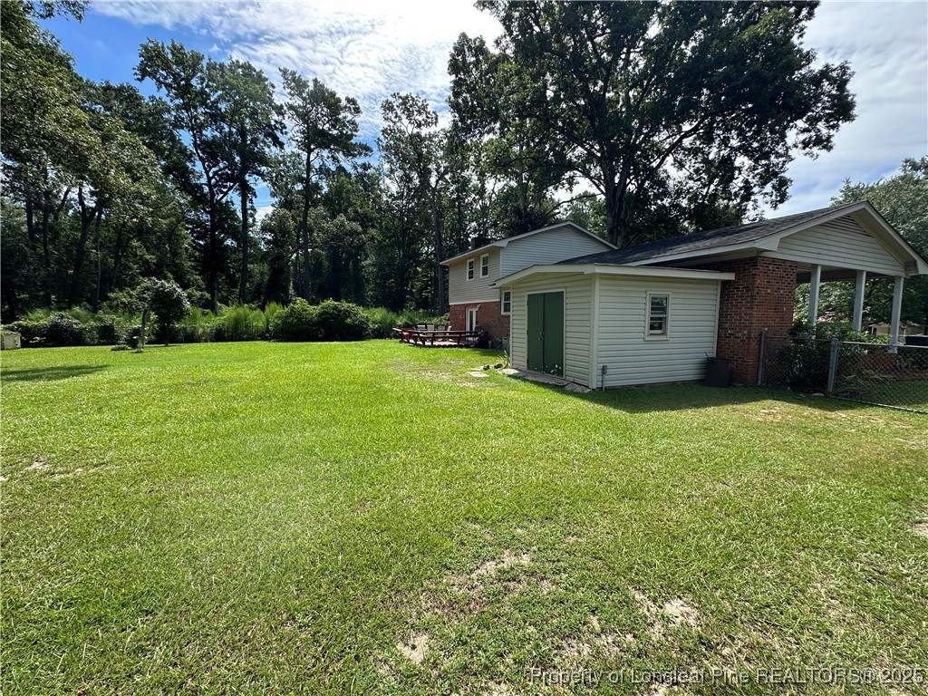 3120 Hampstead Road Lumberton, NC 28360 - Photo 5 of 30 a view of backyard of house with green space