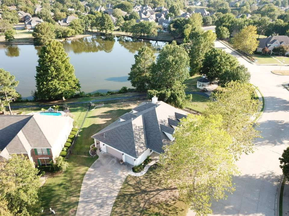 115 South Forest Ridge Boulevard Broken Arrow, OK 74014 - Photo 45 of 50 Property featuring a large driveway, established trees, and a gazebo