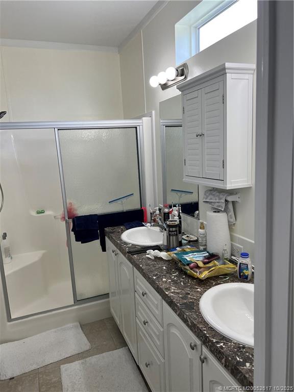 4191 2nd Court Lantana, FL 33462 - Photo 8 of 12 a bathroom with a granite countertop sink and a mirror