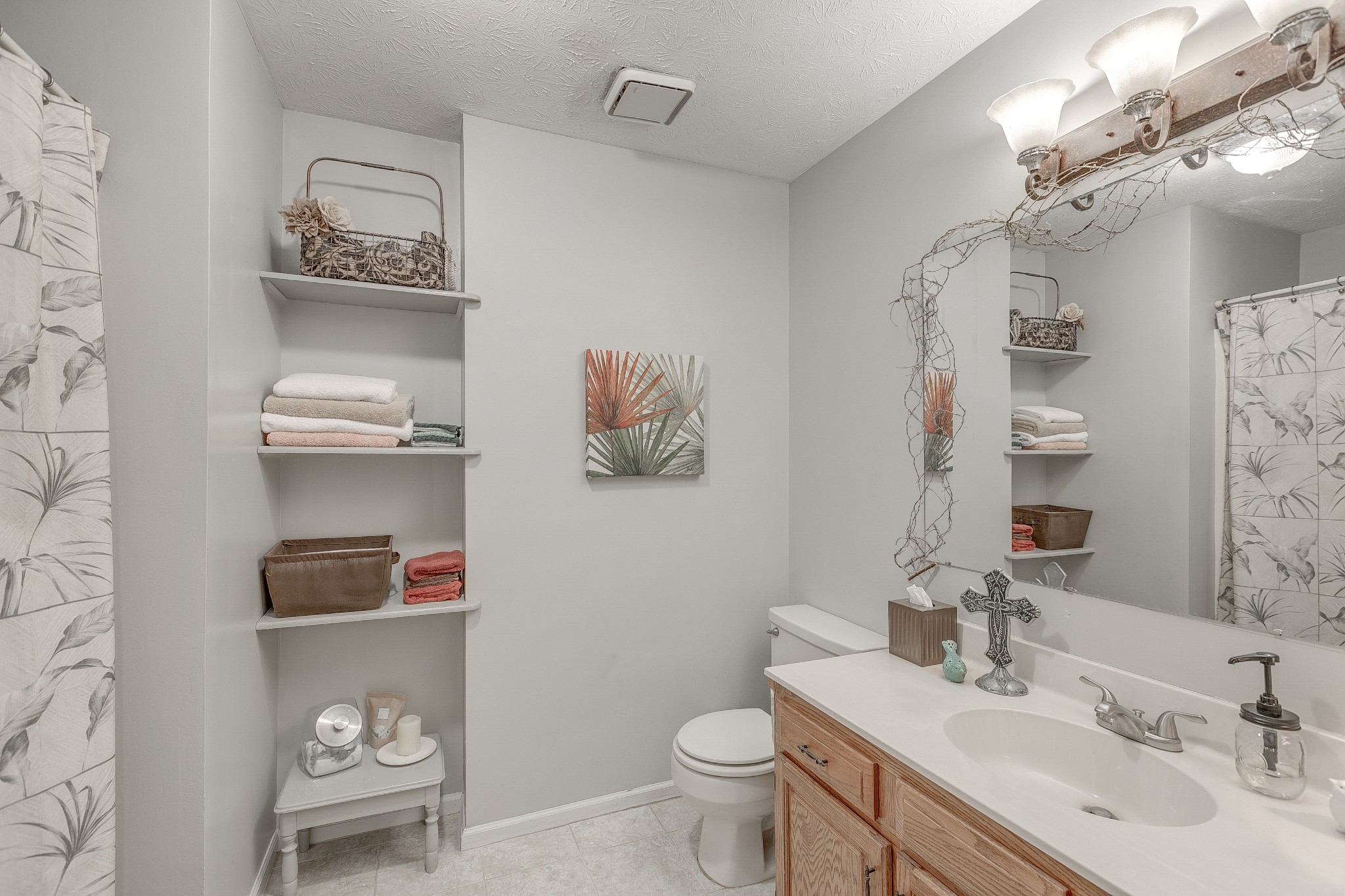 3385 Ridgefield Drive Murfreesboro, TN 37129 - Photo 14 of 25 a bathroom with a sink vanity and toilet