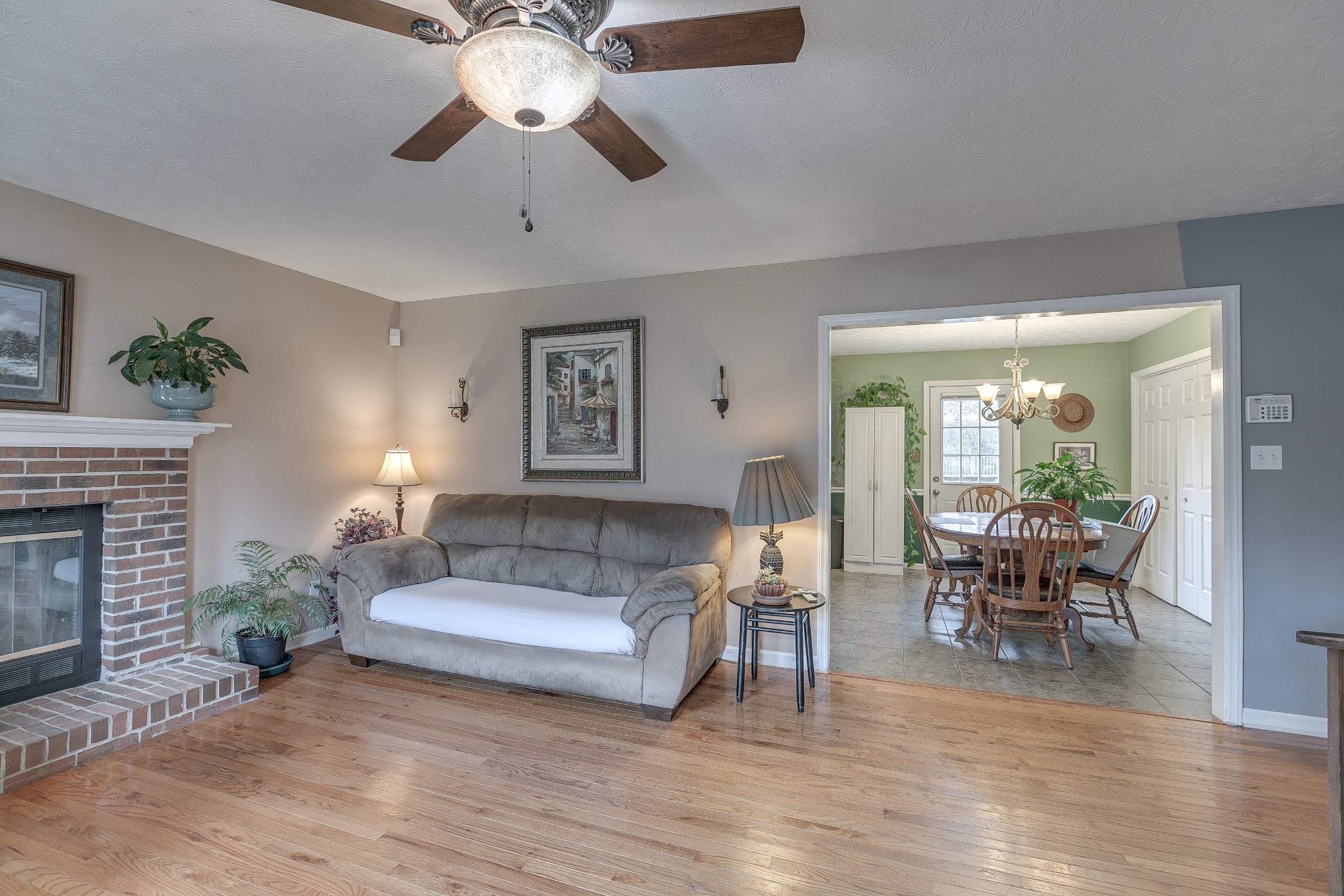 3385 Ridgefield Drive Murfreesboro, TN 37129 - Photo 4 of 25 a living room with furniture and a fireplace