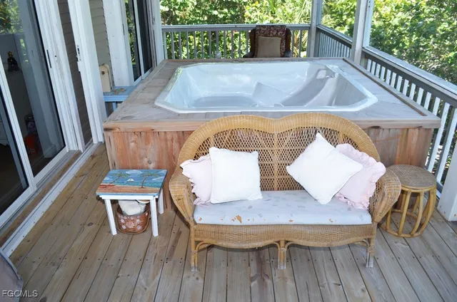 a view of table and chair with wooden floor