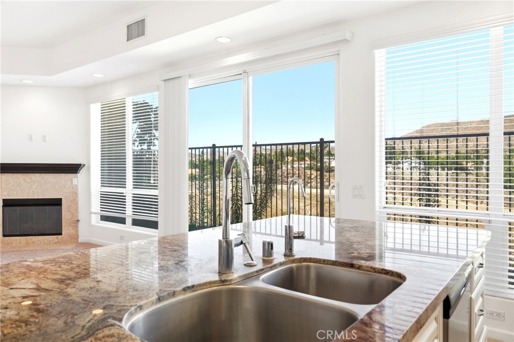 585 Vía Pueblo Riverside, CA 92507 - Photo 35 of 61 Kitchen with a gorgeous view of the hills and city