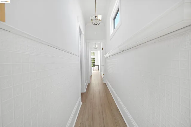a bathroom with a sink vanity and a mirror