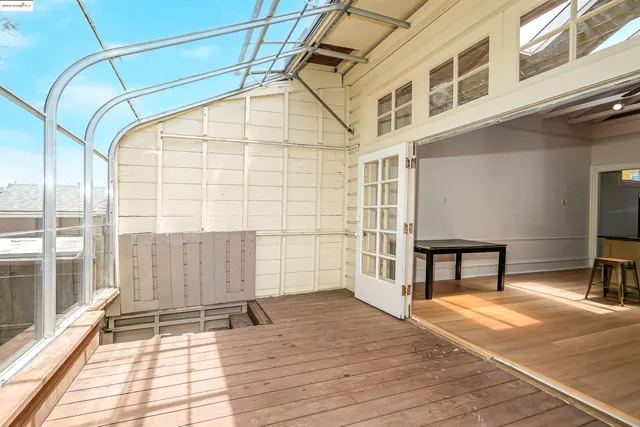a bedroom with a bed and cabinets