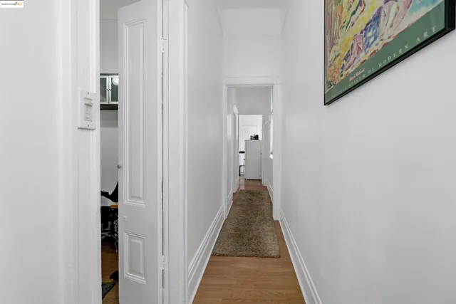 a bathroom with a double vanity sink and mirror