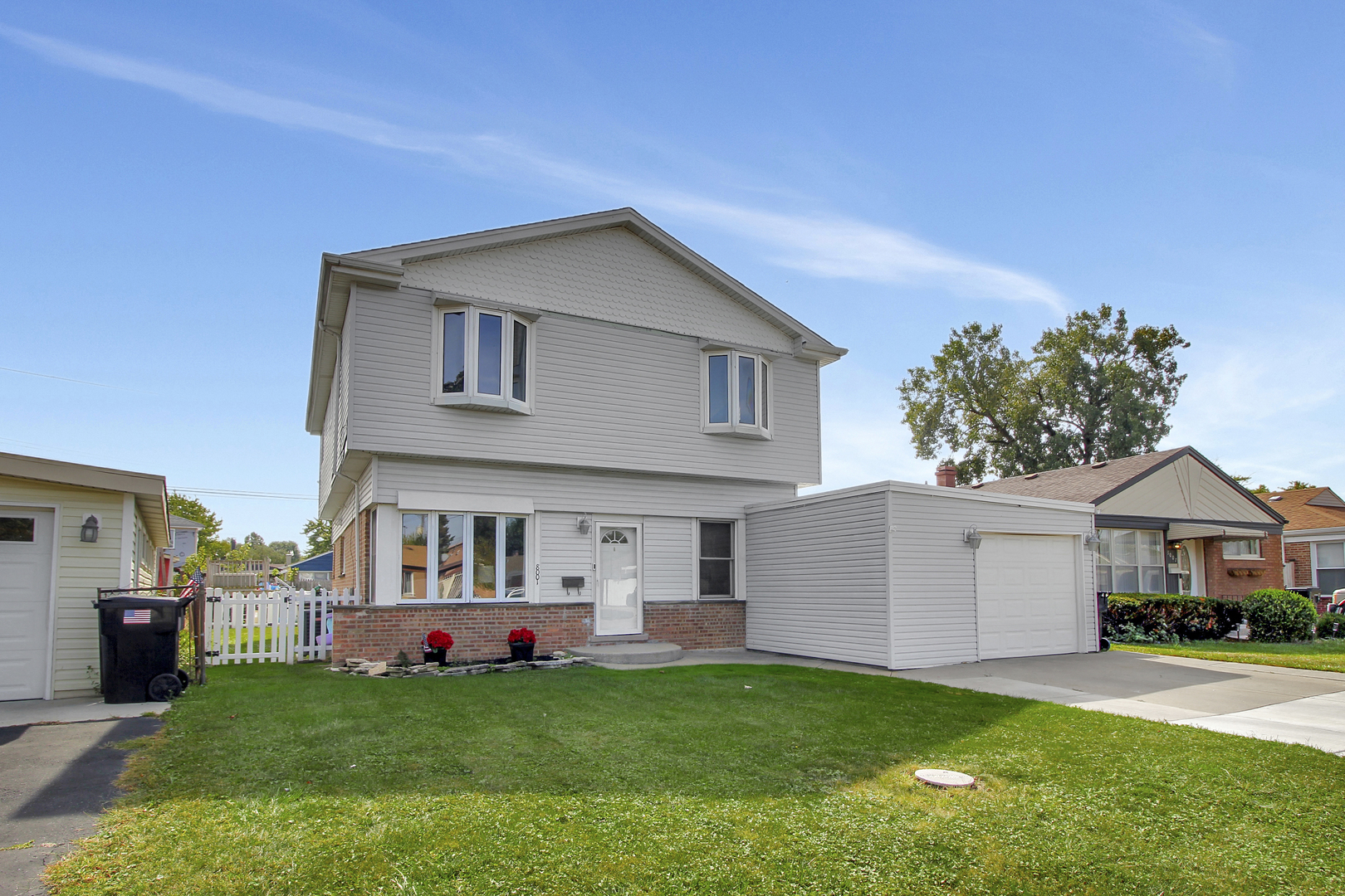 8001 South Kilpatrick Avenue Chicago, IL 60652 - Photo 1 of 25 a front view of house with yard and green space