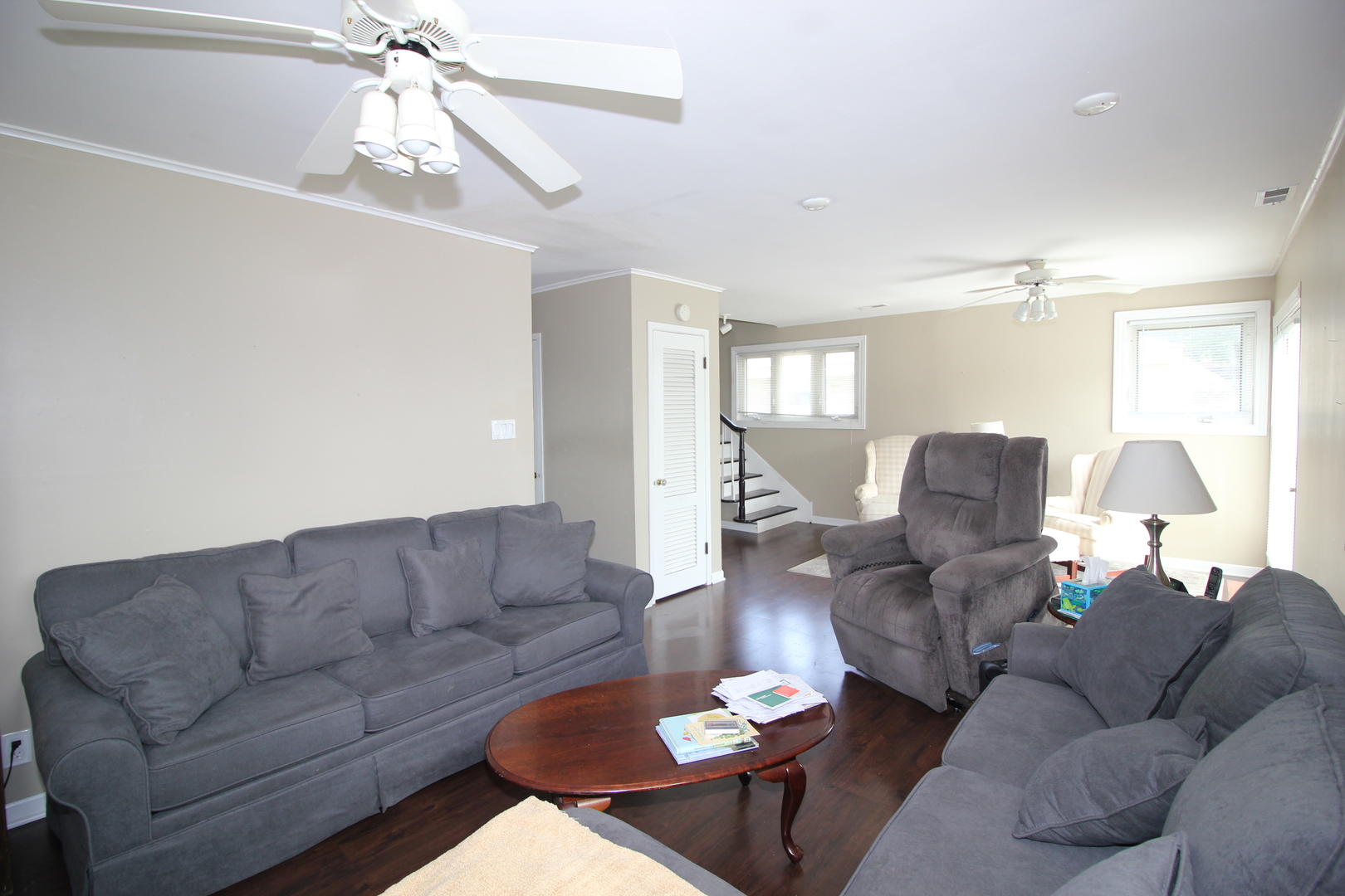 8001 South Kilpatrick Avenue Chicago, IL 60652 - Photo 12 of 25 a living room with furniture and a chandelier